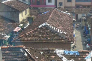 View from our hotel. The blue barrels catch rainwater, and we could see the women fetching buckets to take indoors in the morning.