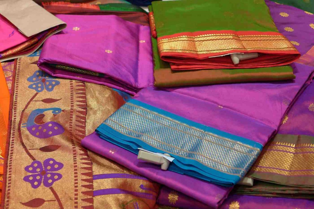 More handwoven silk sarees, all iridescent and finely embroidered.